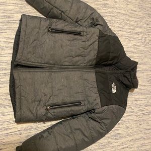 Dark grey and black north face winter jacket barely worn!